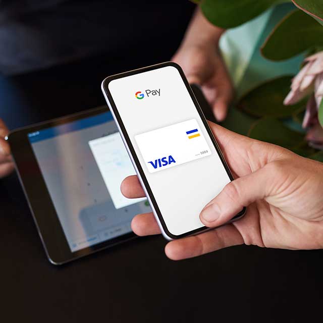 Smart phone displaying Visa Google Pay.